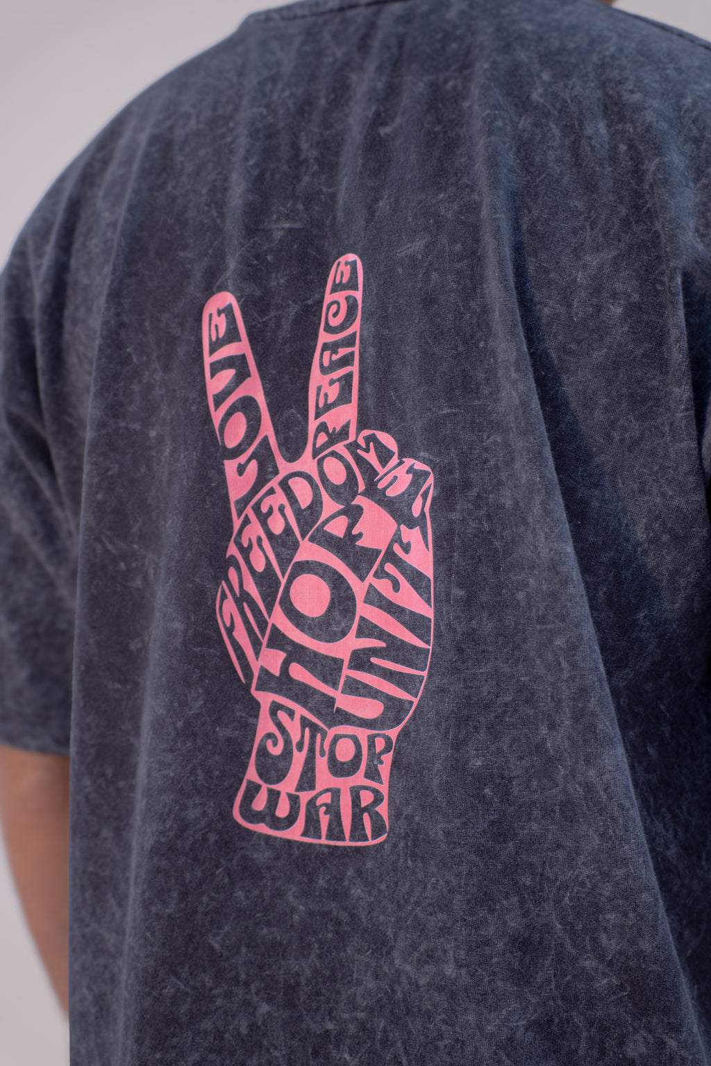 GRAPHIC WASHED OVERSIZED T-SHIRT- STOP WAR