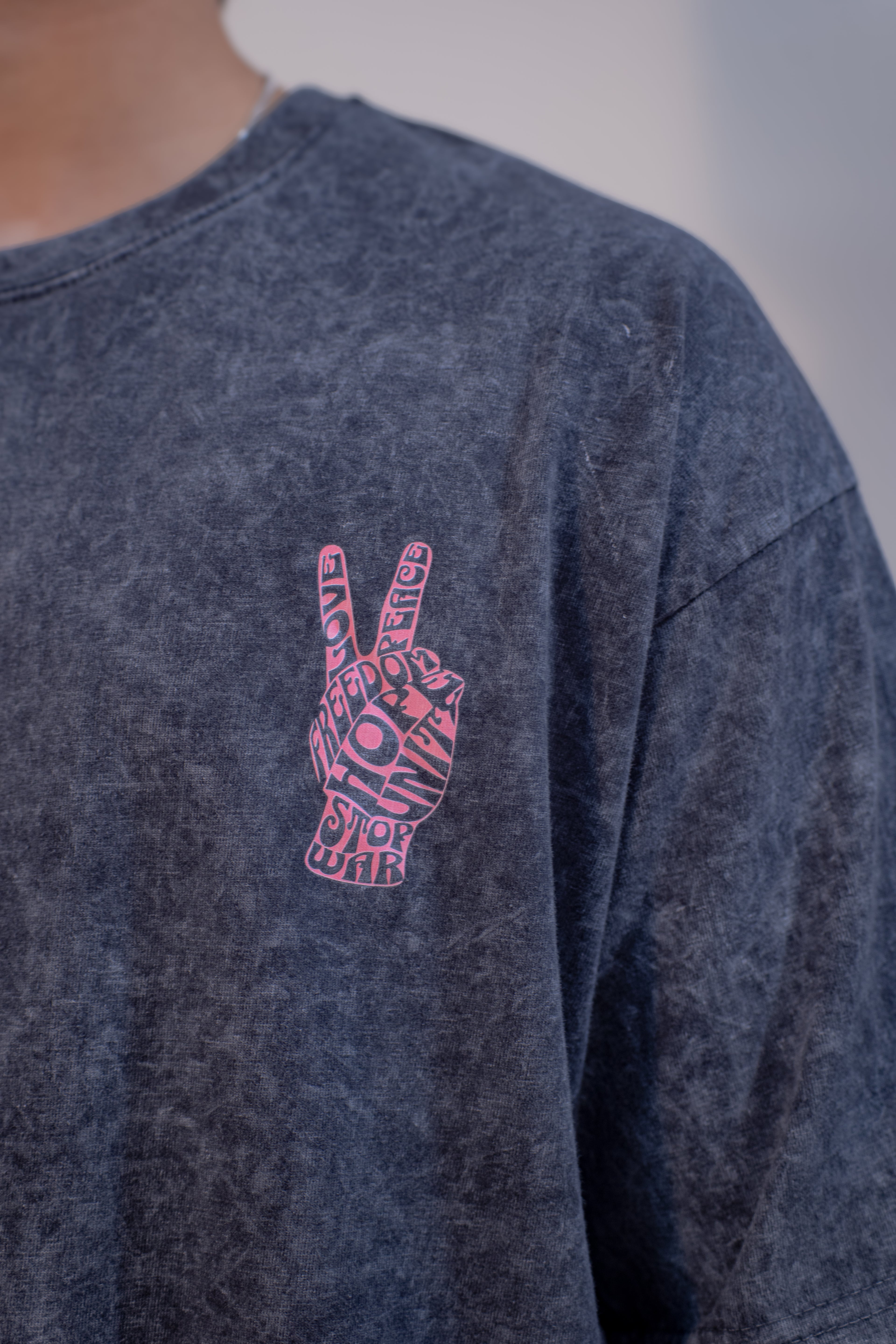 GRAPHIC WASHED OVERSIZED T-SHIRT- STOP WAR